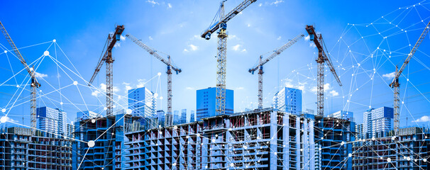 Construction technology banner background. Construction site with cranes, fittings and concrete.