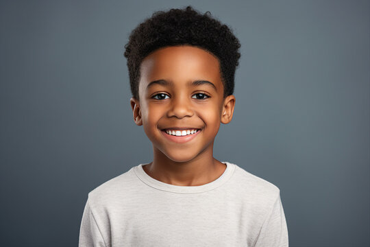 Portrait made with generative AI of a cute cheerful smiling small boy isolated on dark grey background
