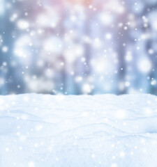 Winter background with snow and falling snowflakes. Blurred Christmas background