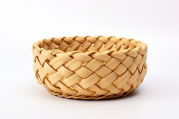 Woven basket made of bamboo, isolated on a white background