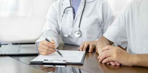 Female doctors who treat patients make an appointment to listen to the results after a physical...