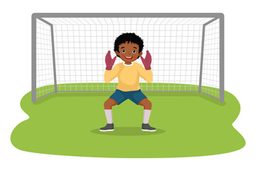 Fototapeta premium Little African boy playing soccer ball as a goalkeeper standing to defend the goal