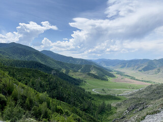 Obraz premium Landscape of mountains under blue sky with clouds, Mountain Altai.