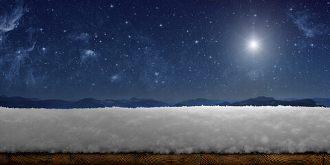 a winter Christmas background with snow on the wood - obrazy, fototapety, plakaty