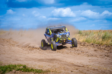 Obraz premium Amazing view on sandy active UTV. Extreme ride on 4x4