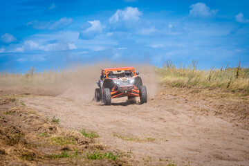 Obraz premium Amazing view on sandy active UTV. Extreme ride on 4x4