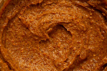 Baby food, vegetable puree close-up. Apple-carrot puree chopped in a blender. Background texture of food for newborn children.