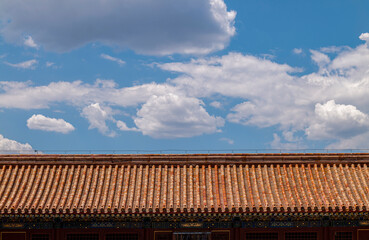 Rooftop in Forbidden City against cloudy sky. Beijing, China