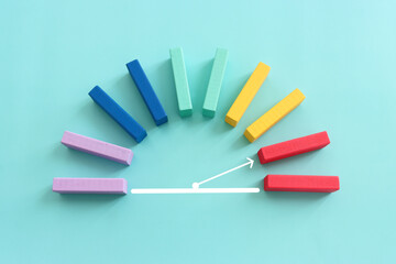 Concept image of barometer made from colorful cubes. Idea of risk level and assessment - obrazy, fototapety, plakaty
