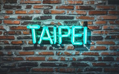 Taipei words in cyan and red neon sign on brick wall with Generative AI.