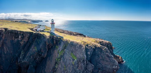 Tuinposter Aerial view of the lighthouse on the island of Arranmore in County Donegal, Ireland © Lukassek