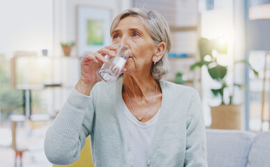 Wellness, home or healthy old woman drinking water for healthcare or natural vitamins in a house....