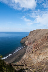 Fototapeta na wymiar Las Gaviotas playa, Canary Islands beach with black volcanic sand located at the foot of a cliff