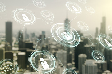 Double exposure of abstract virtual social network icons on blurry cityscape background. Marketing and promotion concept
