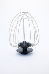 A stirrer or whisk is a cooking tool that functions to mix dough ingredients perfectly, isolated on white