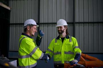 Engineer work at robotic arm factory.