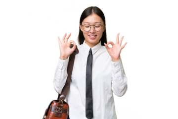 Young Asian business woman over isolated background in zen pose