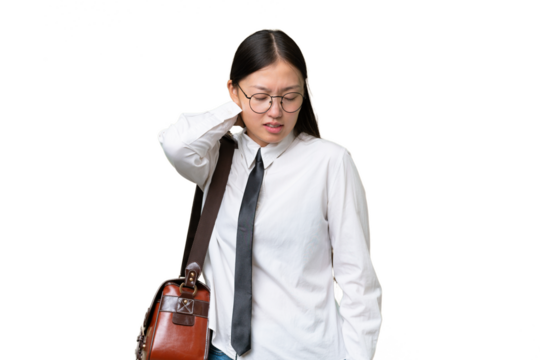Young Asian business woman over isolated background with neckache