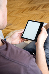 Man holding e book in hands