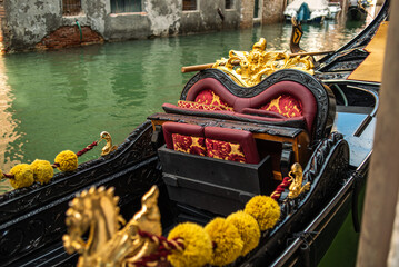 Gold decoration on the gondola. Detail Venetian Gondola Stern Detail or Ornament on the Grand Canal in Venice - obrazy, fototapety, plakaty