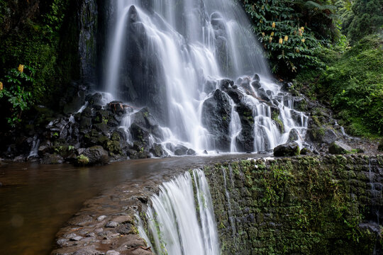 Long exposure of Cascata da Ribeira dos CaldeirA�es waterfall on Sao Miguel island, Azores Islands, Portugal, Atlantic