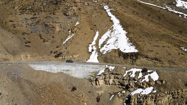 aerial  car in spiti valley himachal pradesh sand mountain Himalaya adventure travel expedition 