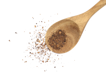 Allspice, pimento spice in wooden spoon, Jamaican pepper, shavings isolated on white, top view
