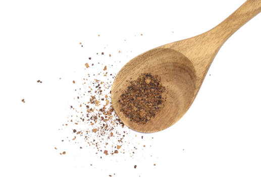 Allspice, pimento spice in wooden spoon, Jamaican pepper, shavings isolated on white, top view