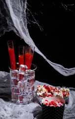 Festive Halloween cocktails and halloween decor for party.