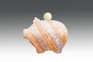 bread in the form of a piggy bank with a coin, the concept of investments in agricultural activities in wheat.