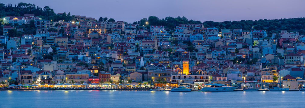 View of Argostoli, capital of Cephalonia and De Bosset Bridge at dusk, Argostolion, Kefalonia, Ionian Islands, Greek Islands