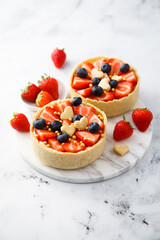 Homemade tarts with strawberry and blueberry