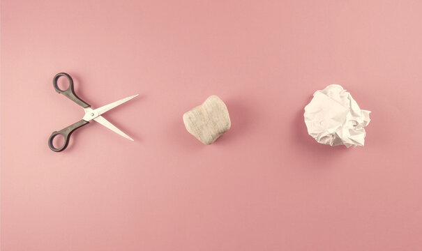 Rock paper scissors. (also known by other orderings of the three items, with "rock" sometimes being called "stone", or as Rochambeau, roshambo, or ro-sham-bo)
