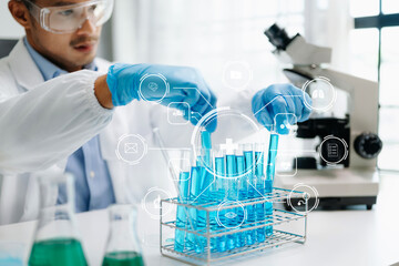 Fototapeta premium Healthcare professional holding Coronavirus COVID 19 vaccine in laboratory study and analyze scientific sample of Coronavirus antibody in lab.