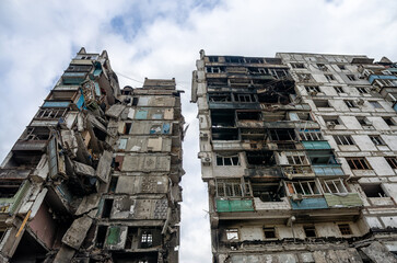 destroyed and burned houses in the city during the war in Ukraine