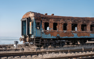 Fototapeta na wymiar damaged and burnt trains in Ukraine