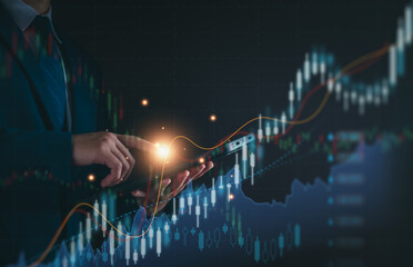 Stock market or forex trading graph and candlestick chart suitable for financial investment concept. Businessman analyzing economy trends background for business idea and all art work design.