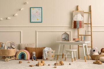 Warm and cozy kids room interior with mock up poster frame, beige wall with stucco, white desk, stool, pillows, plush animal toys, garland on the wall and personal accessories. Home decor. Template.