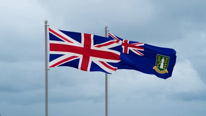 UK United Kingdom of Great Britain flag and British Virgin Islands flag waving together on cloudy sky, endless seamless loop