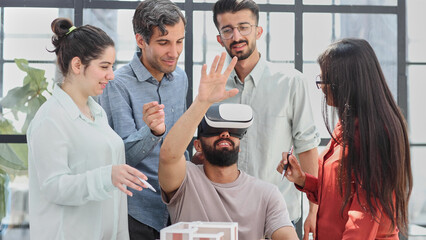 Young business woman giving presentation to coworkers