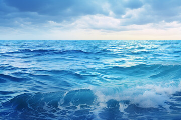Blue water background with waves and ripples, horizon, blue sky and clouds. Panorama of blue clear...