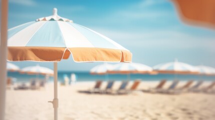 Fototapeta premium sunny beach with parasols with blurred background
