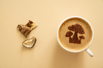 Mushroom coffee concept - mushroom shaped art on coffee cup