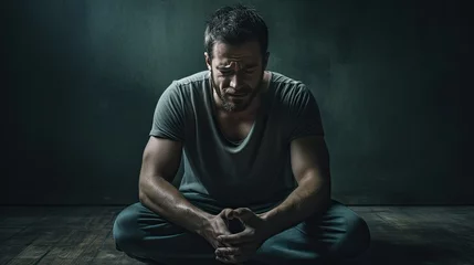 Poster Image of depressed man on a dark background. © kept