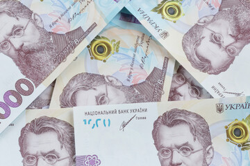  triangle made by one thousand Ukrainian hrivnya banknotes
