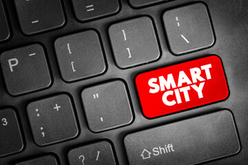 Smart city text button on keyboard, concept background
