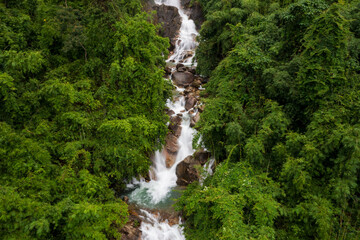 Fototapeta na wymiar Krathing waterfall in the rainy season and refreshing greenery forest in the national park of Khao Khitchakut Chanthaburi province Thailand panorama aerial view for background.