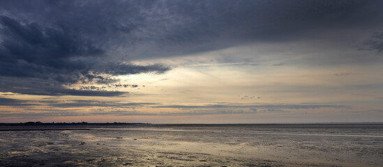 Fototapeta na wymiar Sunset at Paesens. Moddergat. Friesland Netherlands. Waddenzee. Coast Panorama.