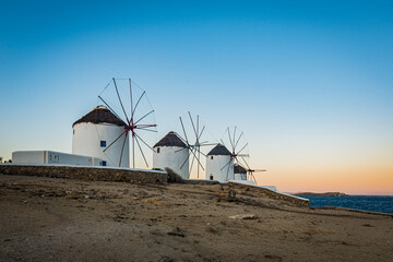 Mykonos windmills in Cyclades Archipielago, Greece. - 653294716