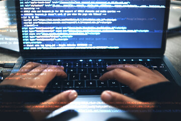 Hands, code overlay and laptop typing with cybersecurity, hacker and software data analysis. Person, programmer and computer work with firewall system hacking and algorithm writing for malware